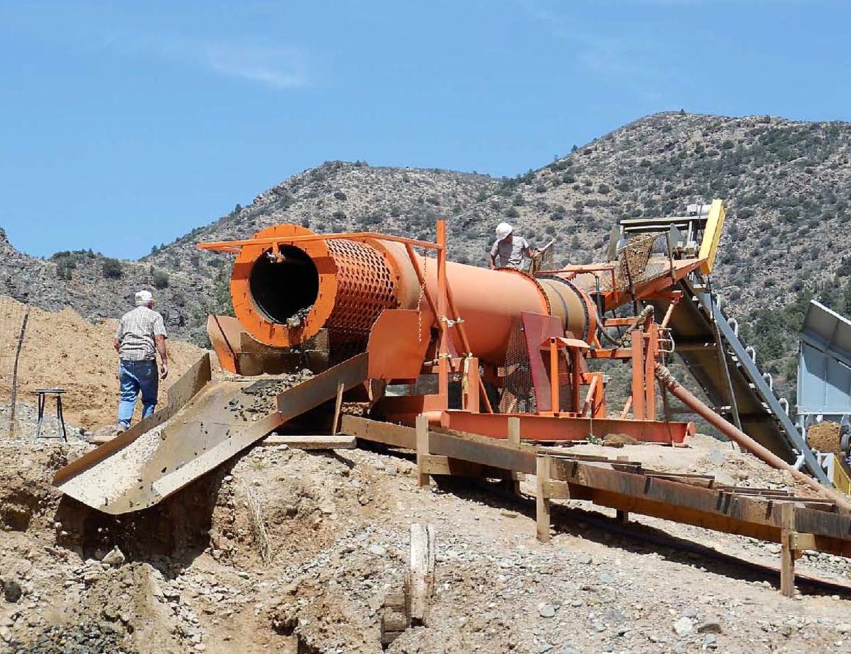Trommel and wash plant working on the hillside at the mine